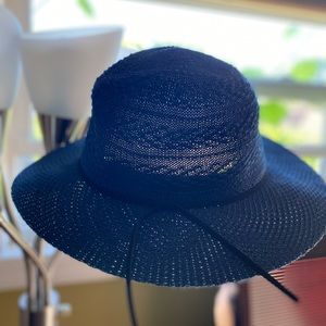 Hand made Never worn blue hat with back tie around from Thailand.